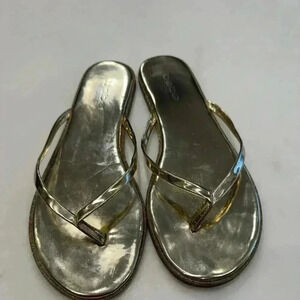 Bebe gold flip flops size 8 great condition